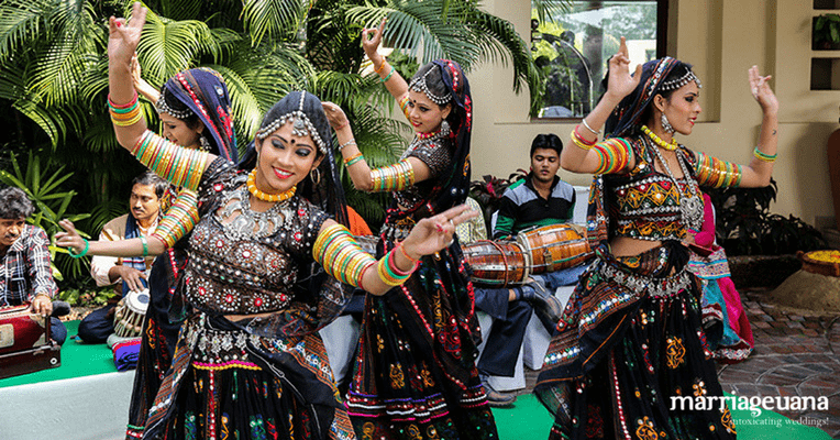 folk dancers in indian wedding